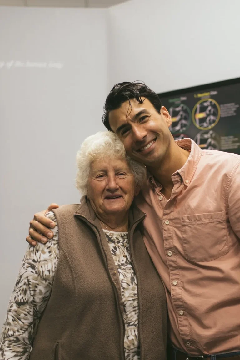 Dr Bobby Fano with adult patient - chiropractic care for seniors and adults