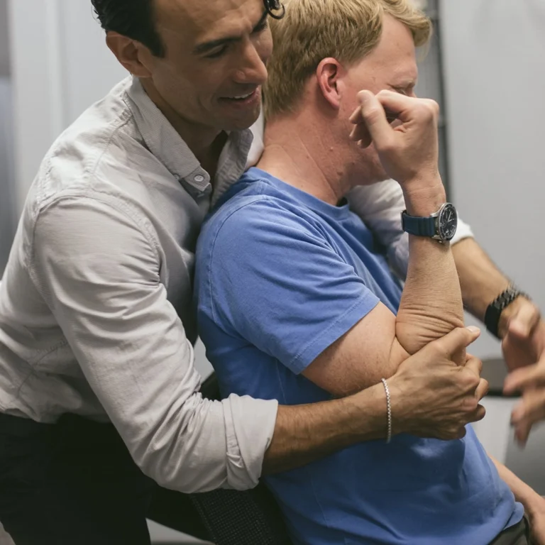 gonstead chiropractor doing extremity adjustment on patient