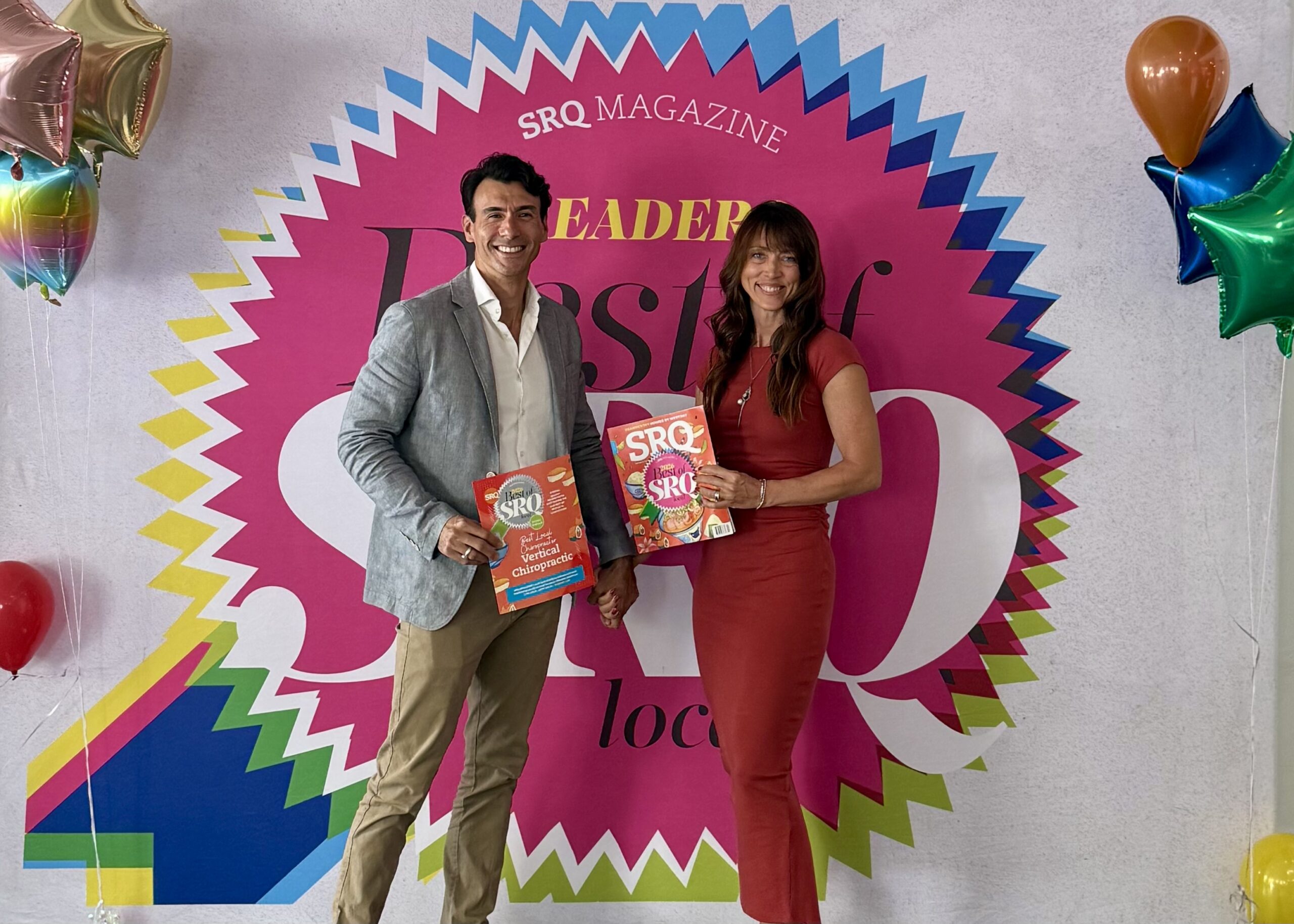 Vertical Chiropractic owner Dr. Bobby Fano celebrating being voted Best of SRQ for 2025 and 2026 in Sarasota.